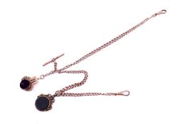 A 9ct gold Albert chain and two carnelian fobs.