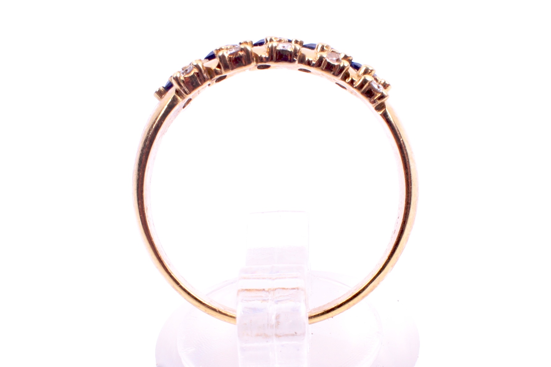 A yellow metal sapphire and diamond set dress ring. Five trap cut sapphires of 0. - Image 3 of 4