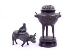 An early 20th century Japanese small bronze censor and a boy on an ox.
