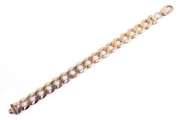 A 9ct gold curb chain link bracelet. With crab claw clasp. 29.