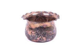 A small early 20th century silver pot.