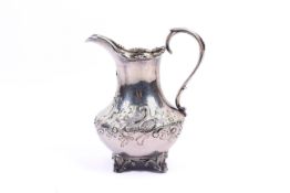 A Victorian silver jug.