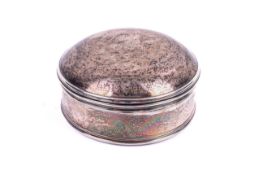 A George II silver round lidded box.