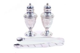 A pair of Late Victorian sterling silver salts cellars and a set of silver tongs.