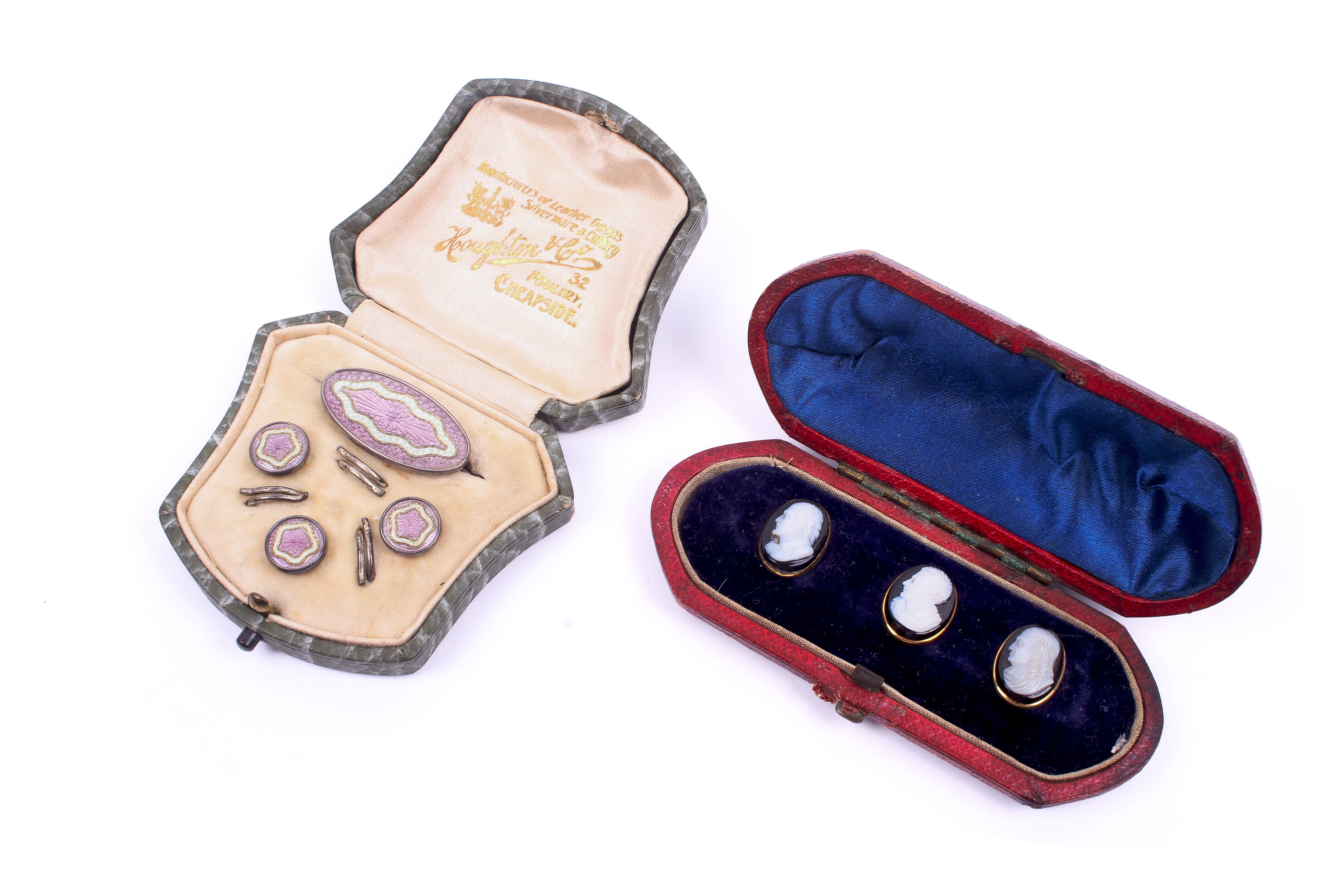 Two sets of dress studs.