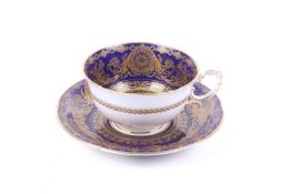 A Royal Worcester porcelain cup and saucer. Circa.