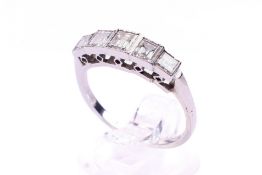 An Art Deco mid 20th century diamond five stone ring.