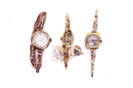 Three vintage ladies gold and yellow metal watches.