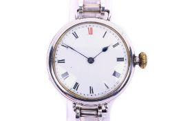 A vintage silver gentlemans watch with a later bike chain style bracelet.