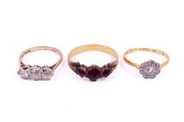 Three 20th century yellow and white metal gemstone rings.