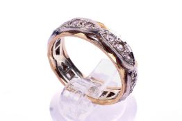 A 9ct gold full eternity ring. Set with synthetic white spinel. Size N, 4.