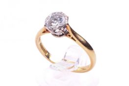 a 18ct gold diamond solitaire ring. Set with one round brilliant cut diamond of 0.