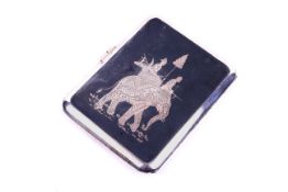 A Siam silver niello cigarette box.