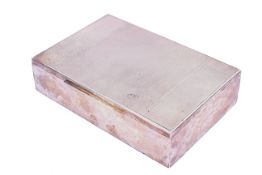 A white metal cigarette box.