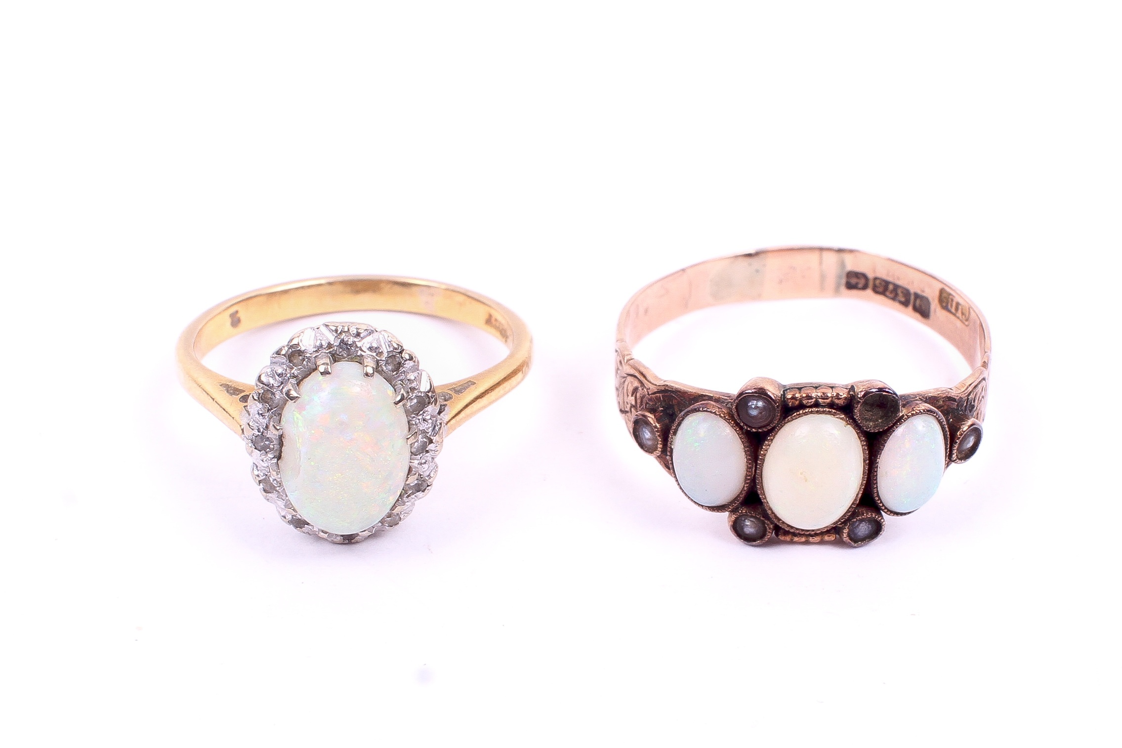 Two 20th century opal set gold dress rings. One hallmarked 9ct gold, size P, 1.7g gross.