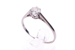 A 20th century diamond solitaire ring. One early round brilliant cut diamond of 0.