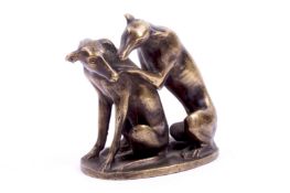 A bronze model of two greyhounds.