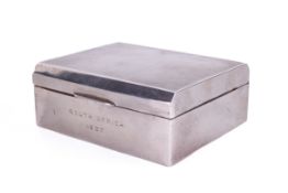 A silver rectangular cigarette box.
