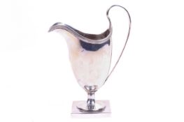A late Victorian silver cream jug.