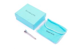 A Tiffany & Co silver golf tee.