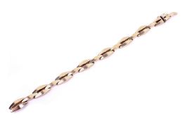 A 9ct gold fancy hollow link bracelet. L18.