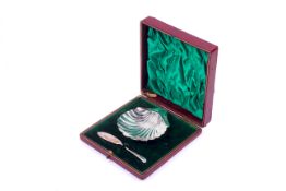 A Victorian Atkin Brothers silver shell form butter dish and knife.