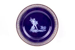 A Meissen porcelain cobalt-blue ground cabinet plate. Circa 1860, attributed to E.A.