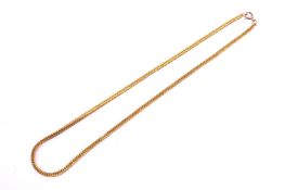 A yellow metal square herring bone link neck chain.