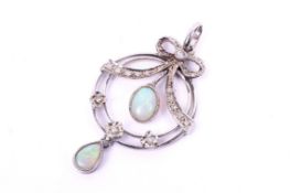 A 9ct white gold opal and diamond pendant.