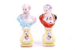 A pair of early 20th century KPM miniature busts on plinths.