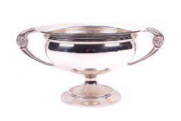 A silver trophy bowl.
