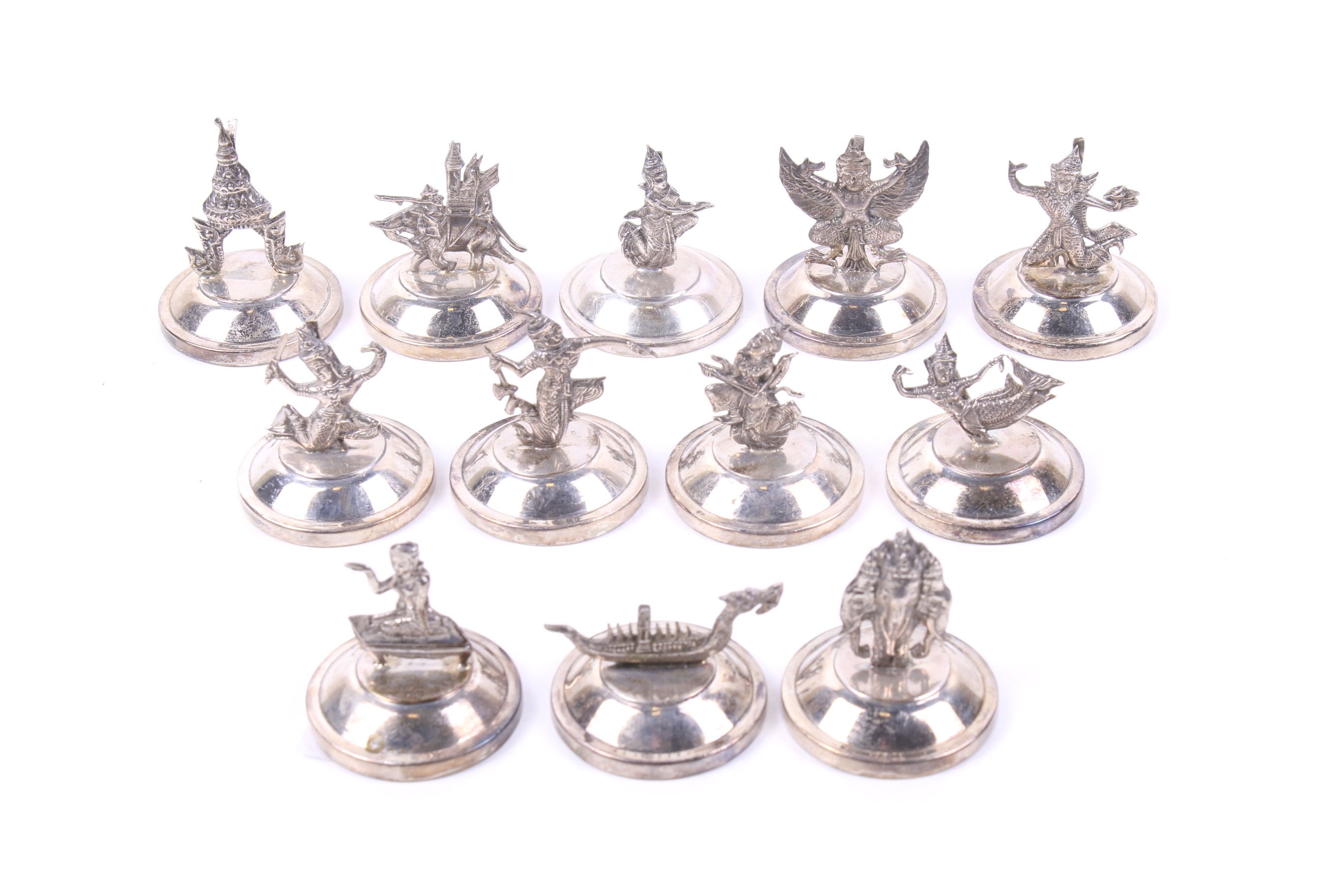 A set of twelve 'Siam Sterling' place markers.