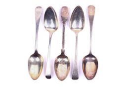 Five 19th century silver serving spoons.