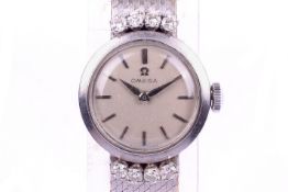 A 20th century Omega 18ct white gold (stamped 750) and diamond ladies dress.