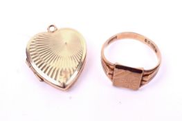A 9ct gold signet ring and 9ct gold heart shaped locket.
