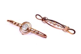 Two yellow metal bar brooches.