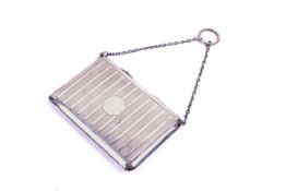A Lady's sterling silver evening purse. Hallmarked Chester, circa 1990. Measuring 10.
