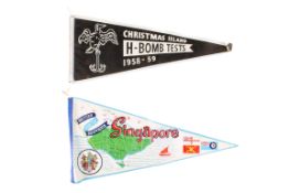 Two man made fabric souvenir flags.