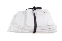 A selection of Damask and white work table linen. Comprising 20 napkins, a 13ft x 5.