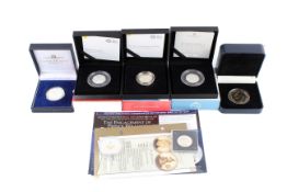 A group of seven modern coins.