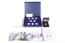 A collection of assorted modern coins and medallions. Including a 2022 UK B.U.