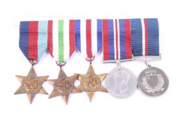 A collection of WWII medals to include a Malta cross.