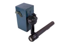 A WWII artillery gun sight and a military compass. The gun sight No 39 MkII.