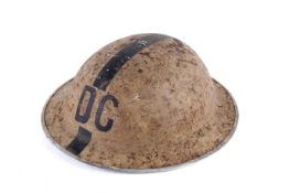 A WWII home front decontamination squad helmet.
