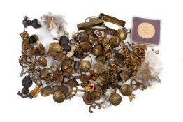 A collection of World War and later military buttons and badges,