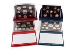 A group of four proof sets.