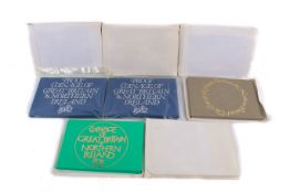Eight proof coin sets. Dated 1972 to 1976 with two 1982 sets.