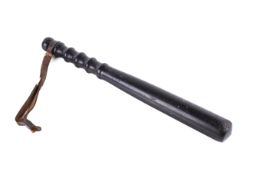 A turned wood truncheon. Engraved marks 'PC B 66' above the handle marks, with leather wrist strap.