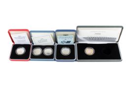 A group of four proof £2 coins. Including two 1989 both types.