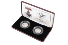 A set of two UK 2006 silver proof Piedfort 50 pence coins.